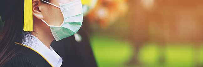 Graduates wear masks to prevent the spread of COVID-19